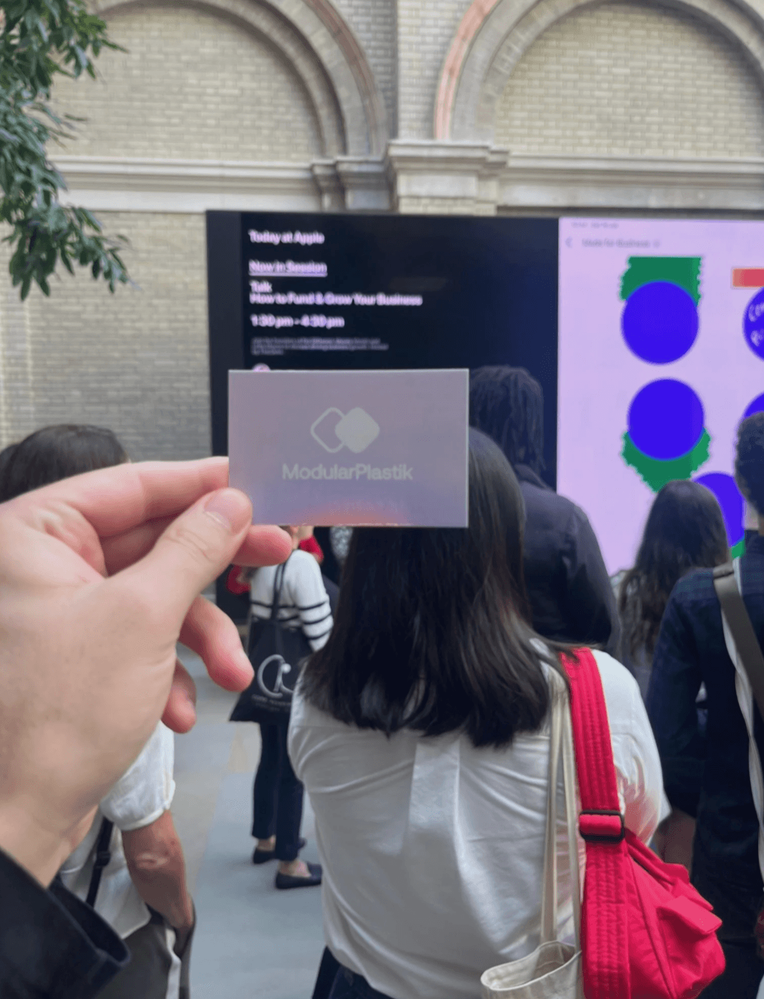 ModularPlastik business card held up at the Made for Business workshop at Apple Covent Garden