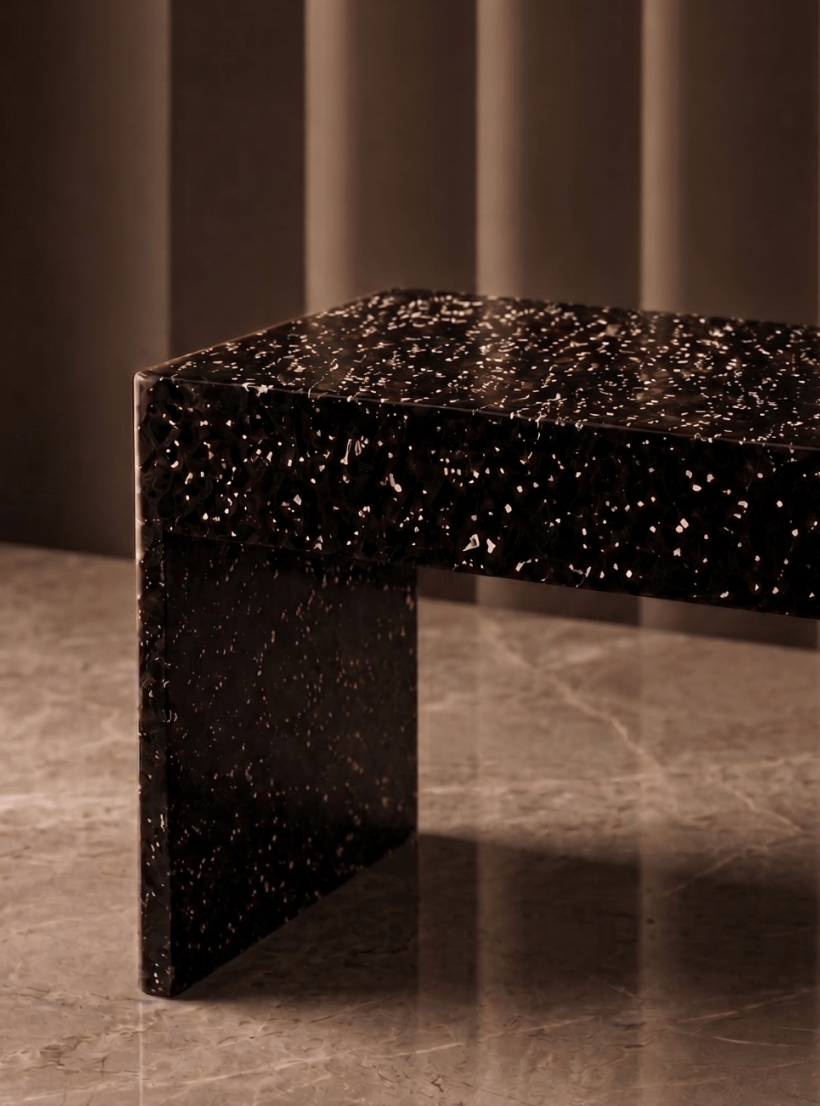 Detail · speckled near-black terrazzo composite